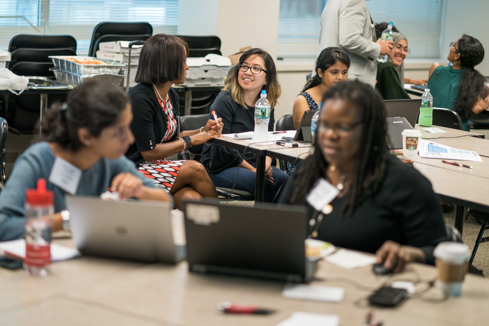 health informatics students collaborating in class